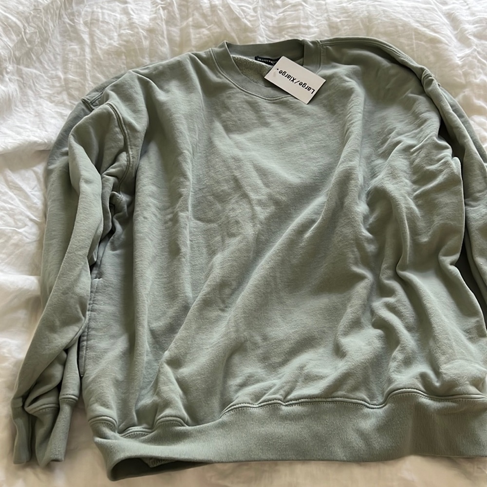 Brandy Melville sweatshirt size large/extra large in blue color